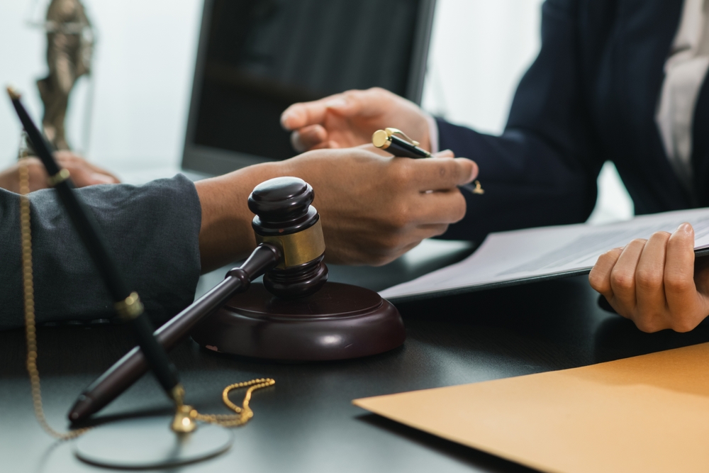 Family discussing a juvenile defense case with an attorney