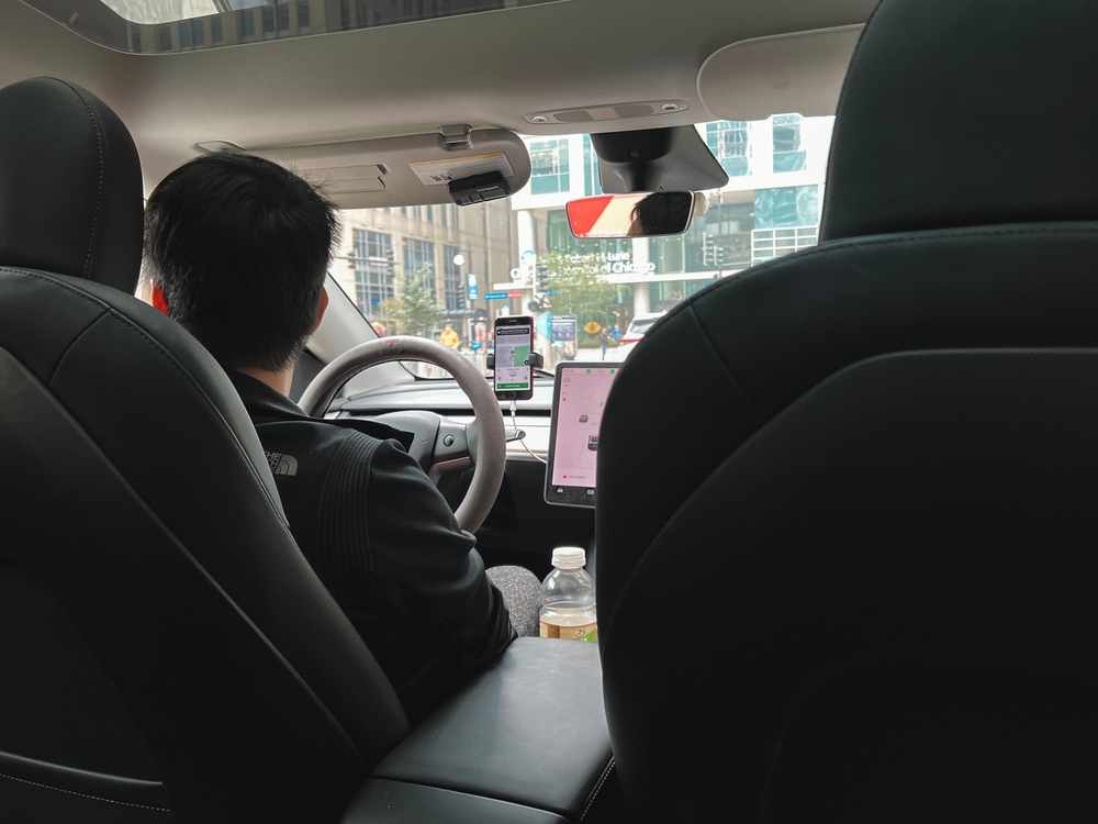 Passenger view from inside an Uber or Lyft vehicle during a ride